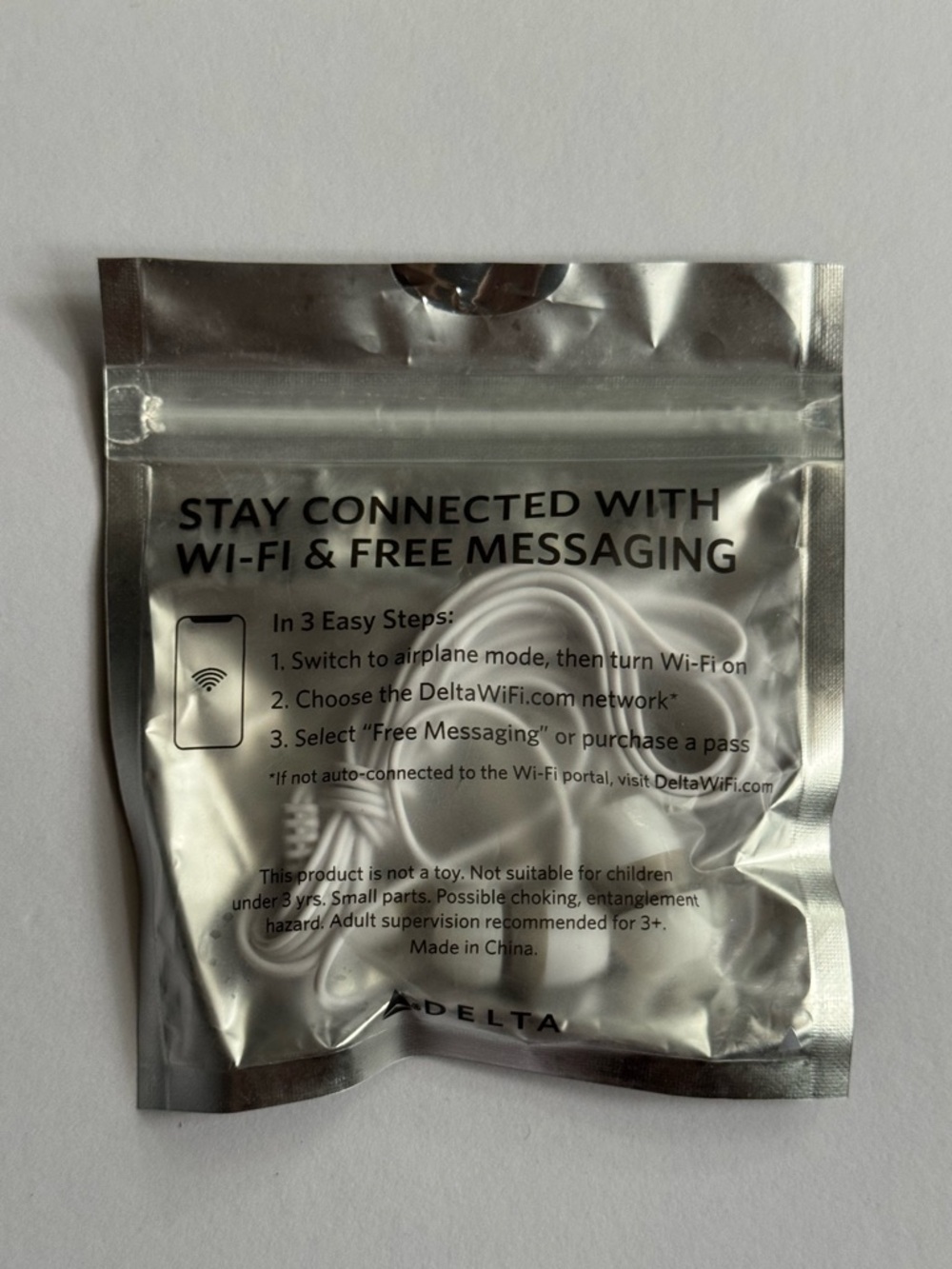Delta Airlines White Wired Earbuds "Plug In-Tune Out" NEW/UNOPENED